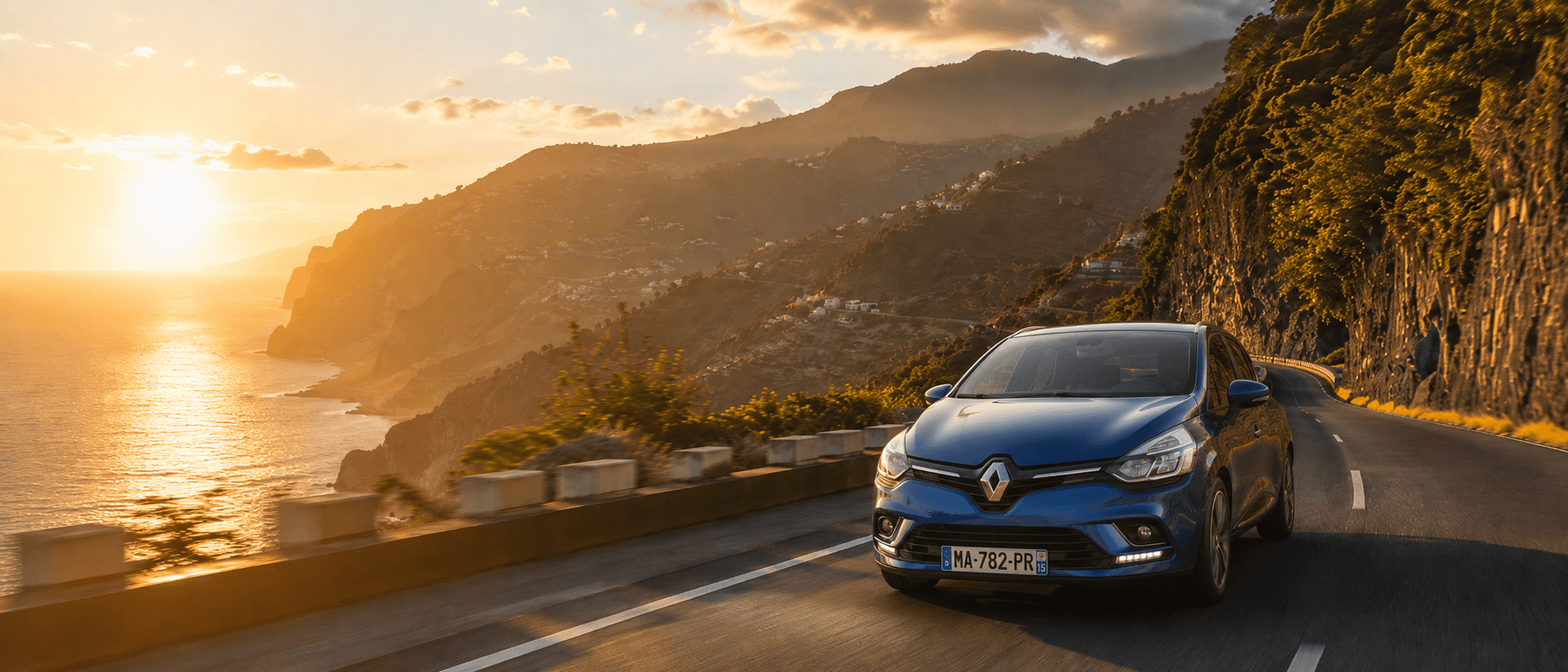 Blue car driving on a scenic Madeira coastal road at sunset